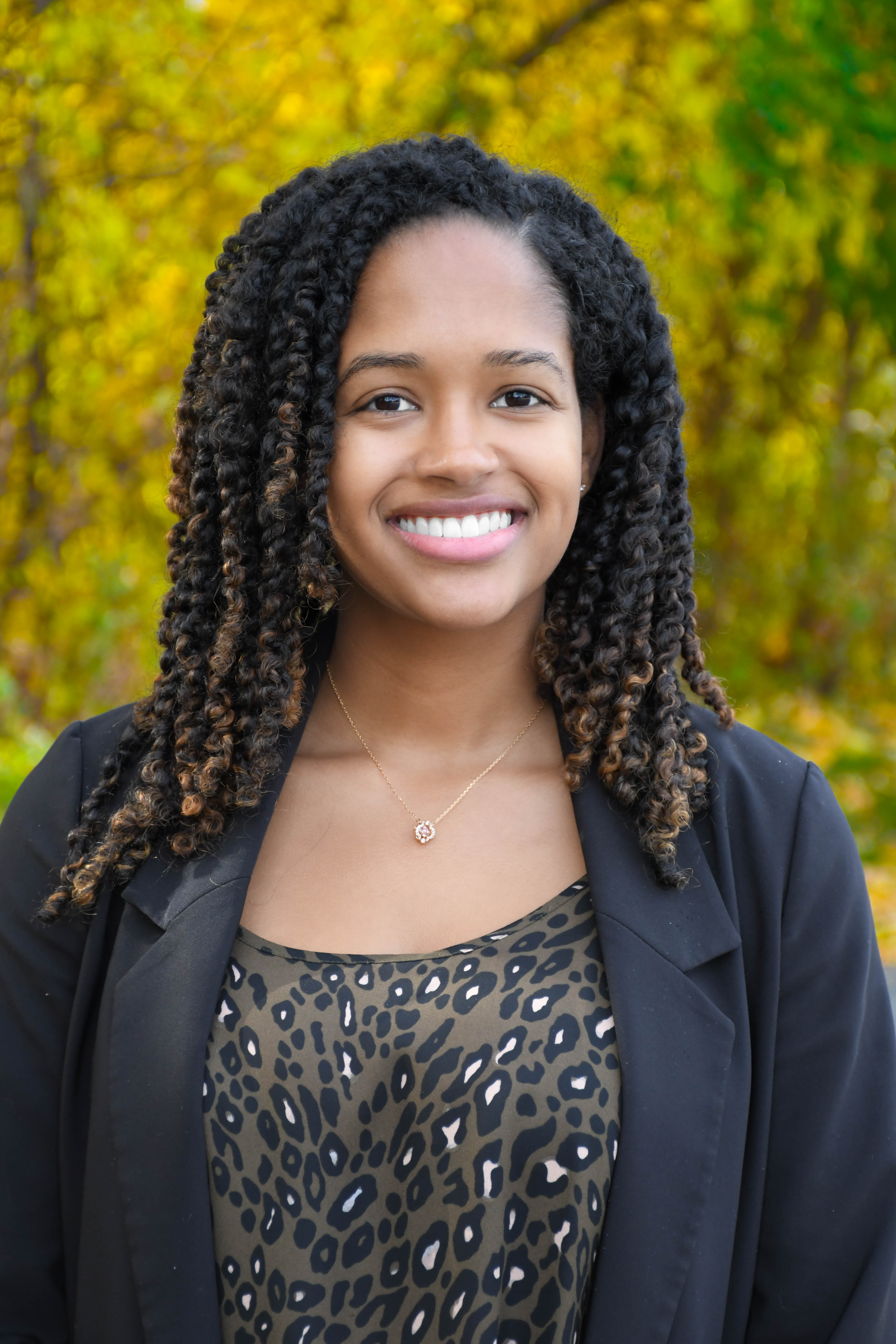 A headshot of Michelle Giles.