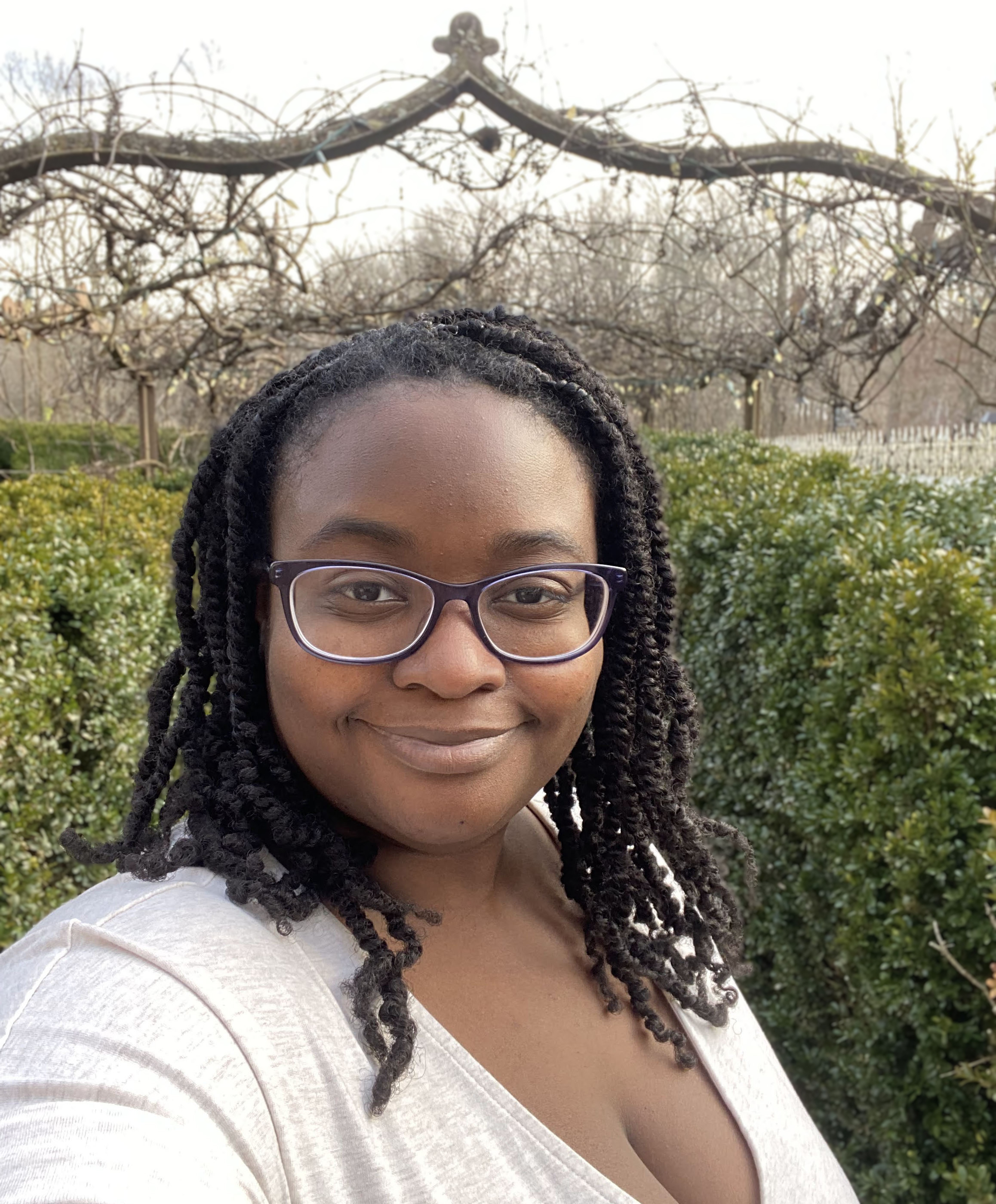 Jessica Dotson takes a selfie with nature behind her.