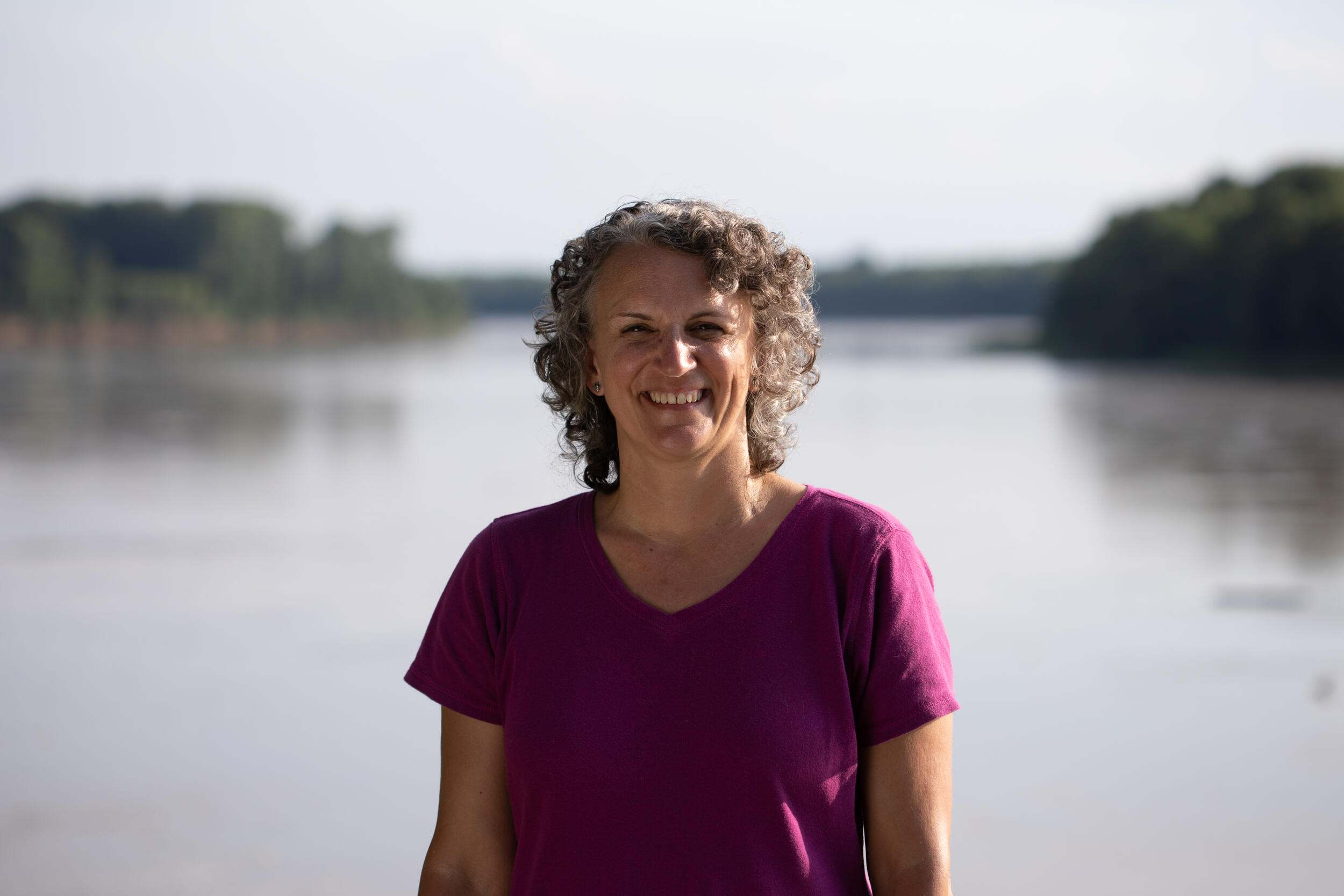 TNC's Carrie Parmenter standing in front of the Wabash River.