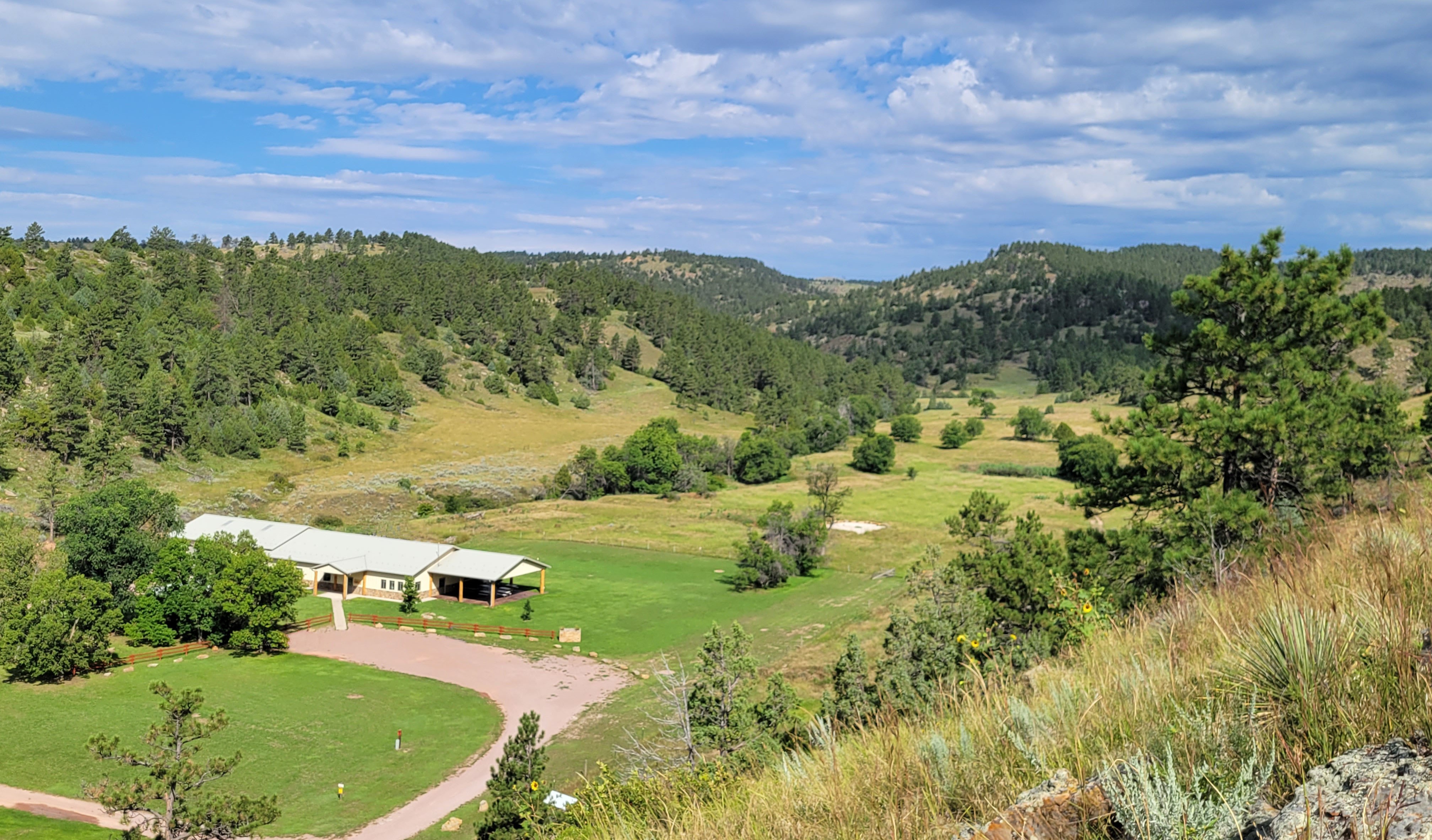 A building surrounded by the Black Hills.